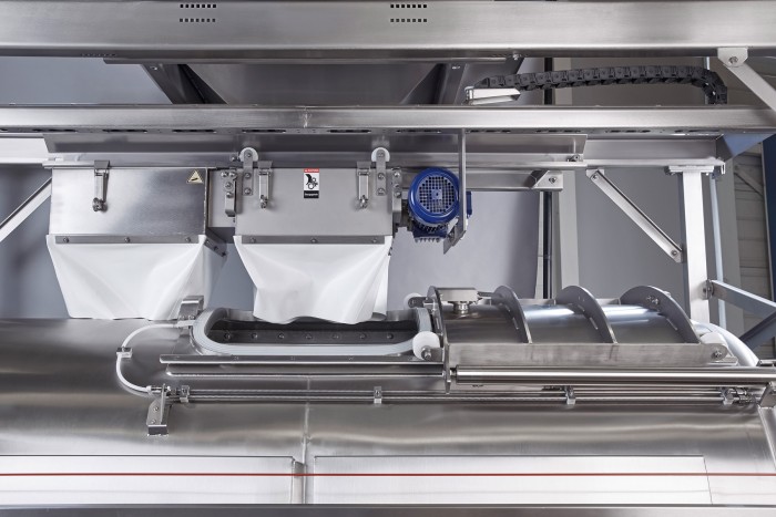 Lej zasypowy nad prasą z walcami zgniatającymi Lej zasypowy nad prasą z walcami zgniatającymi